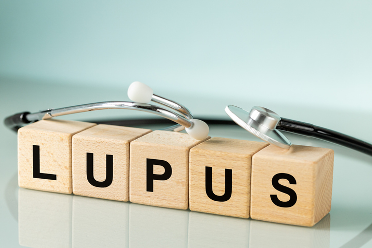 Lupus awareness with stethoscope and lupus diagnosis blocks
